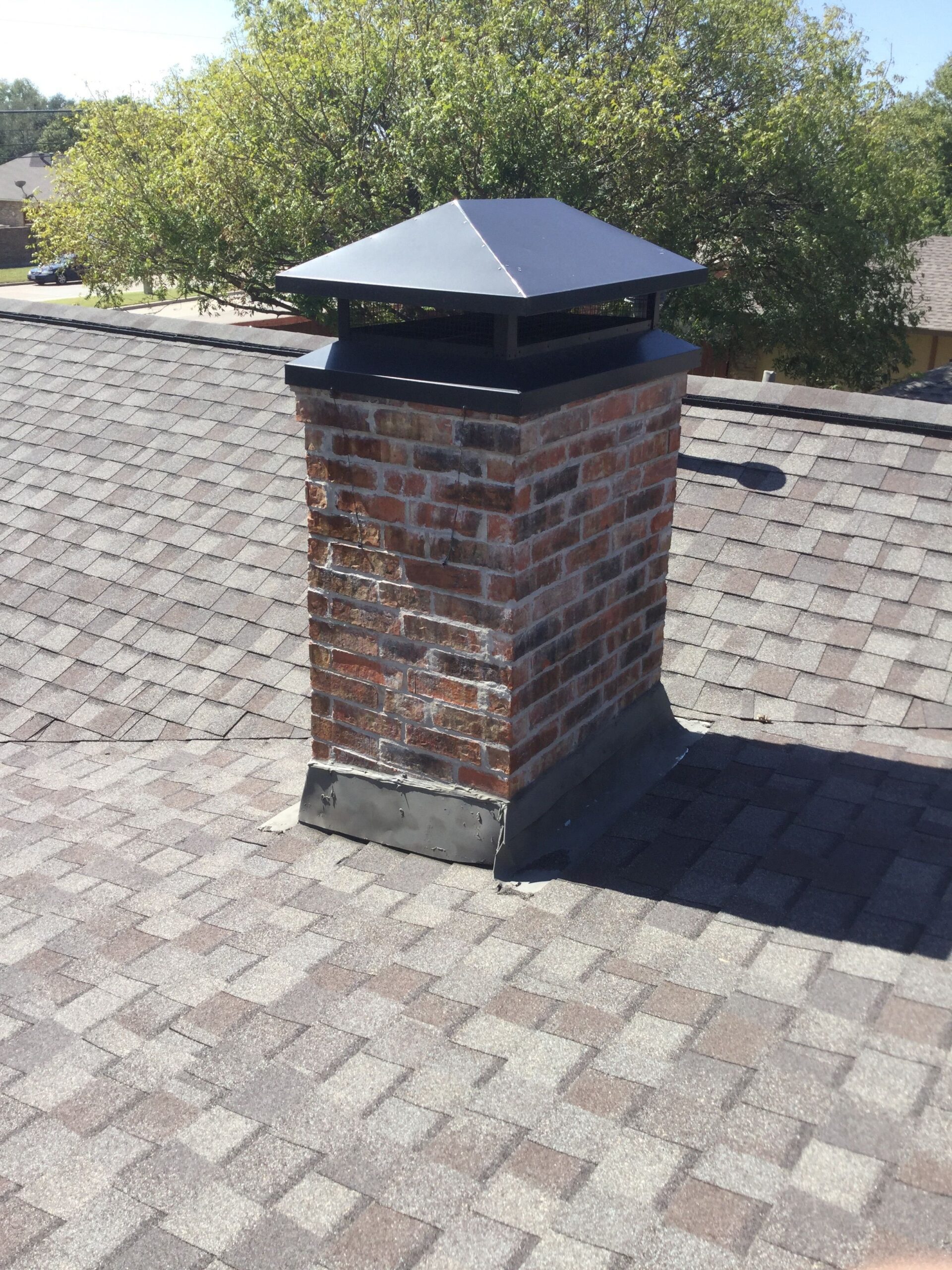 Professionally installed chimney cap protecting the chimney