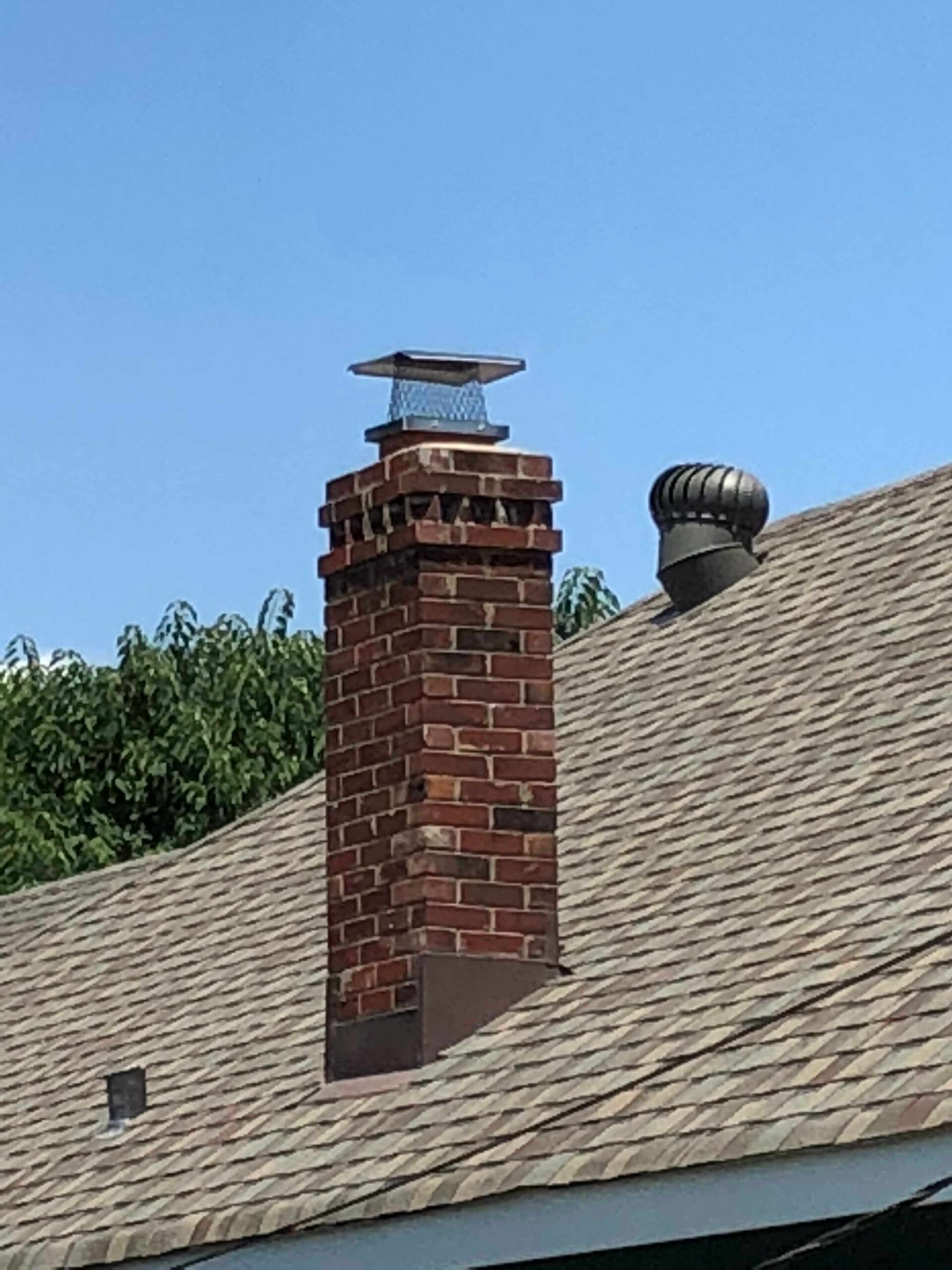 Damaged chimney damper requiring repair