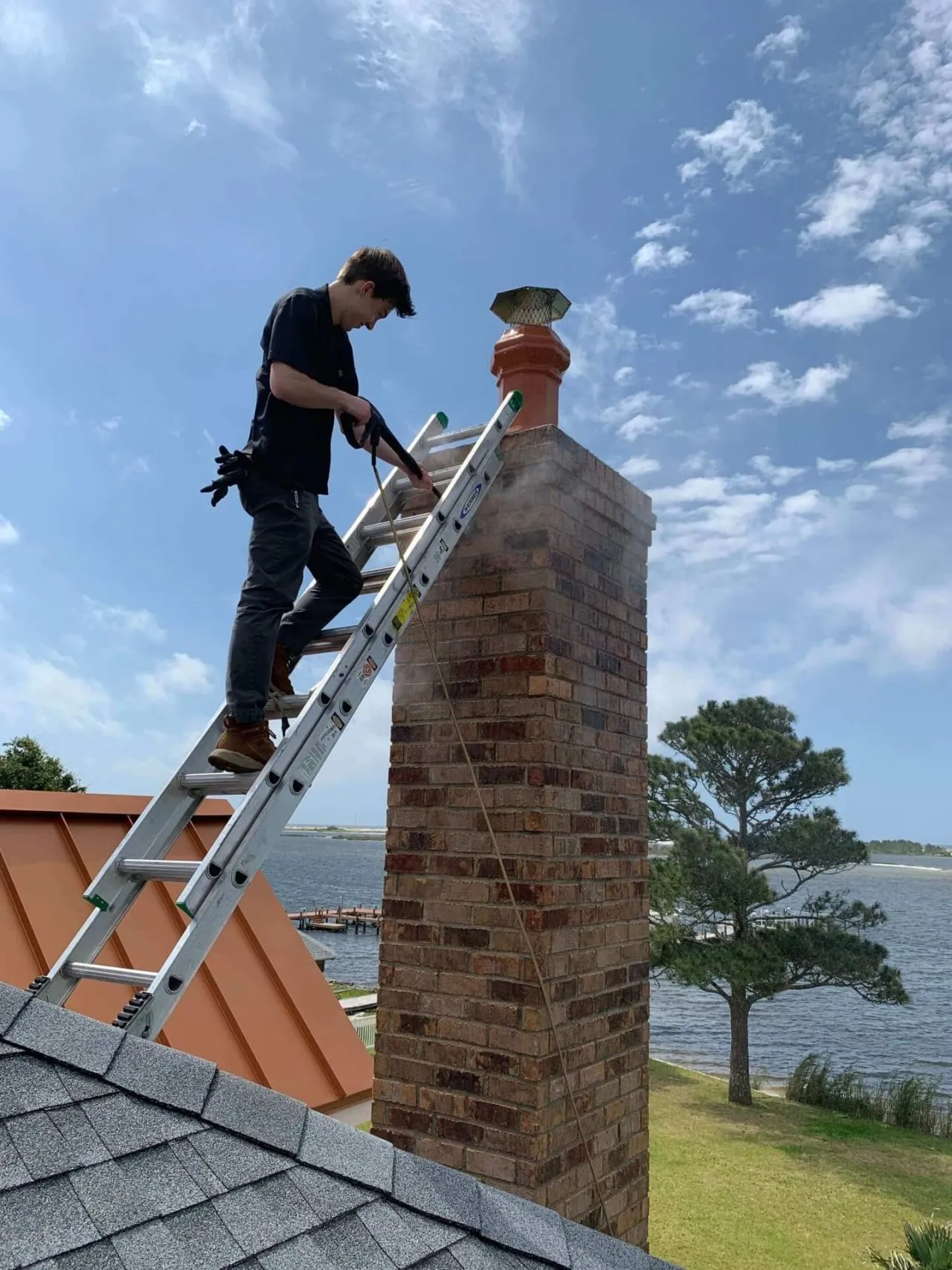 Professional chimney sweep cleaning demonstration