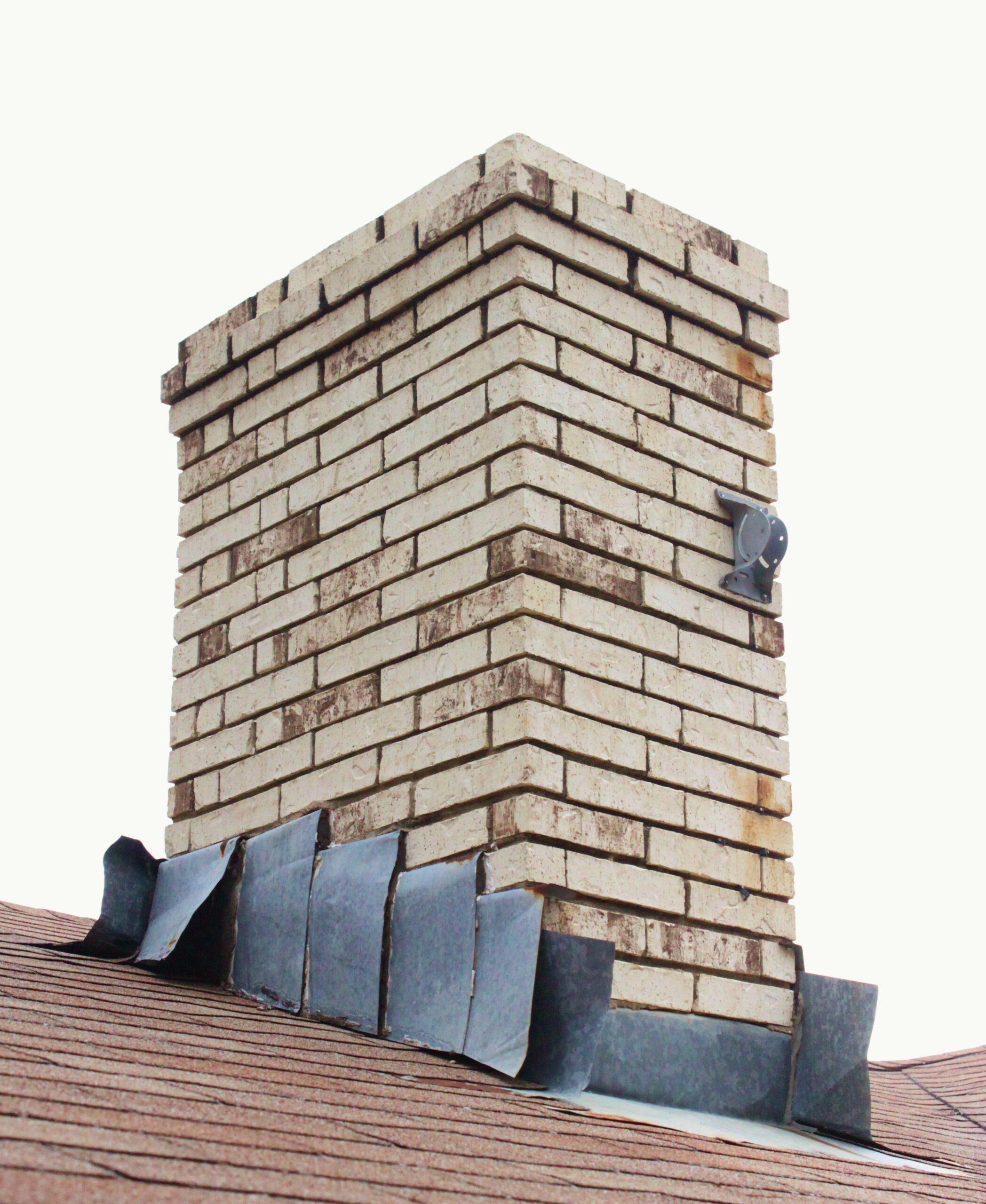 Professionally repaired chimney crown protecting the chimney system